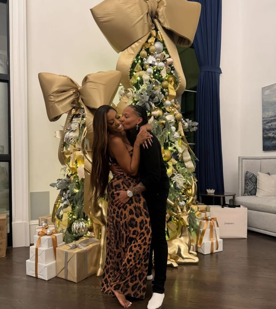 porsha williams debuts new girlfriend on thanksgiving wearing a $128 naked wardrobe leopard dress
