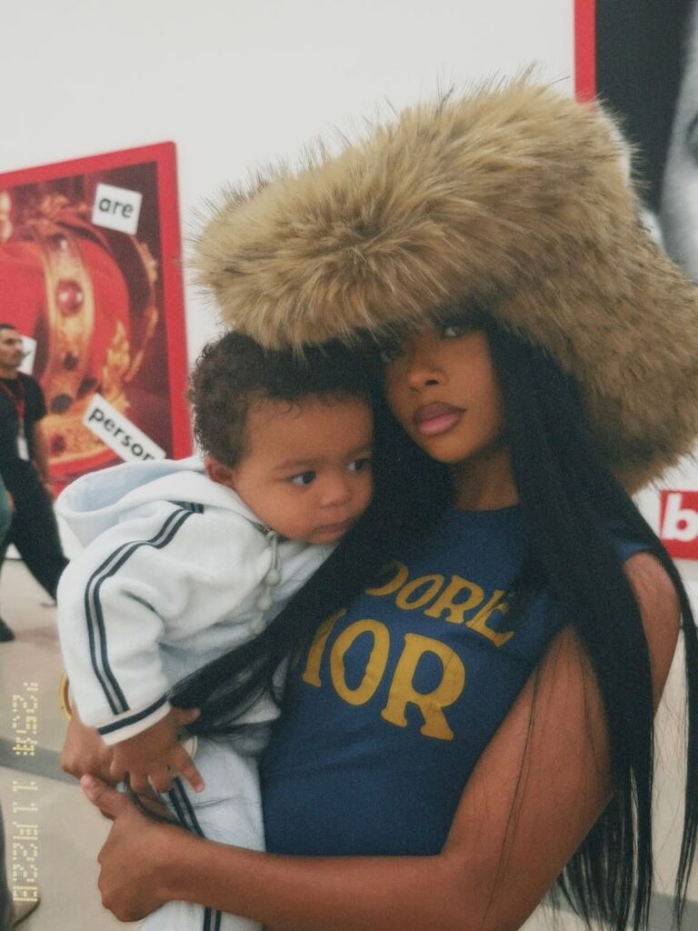 you ask, we answer! skai jackson posed in a brown $295 kim shui faux fur hat for the ‘gram