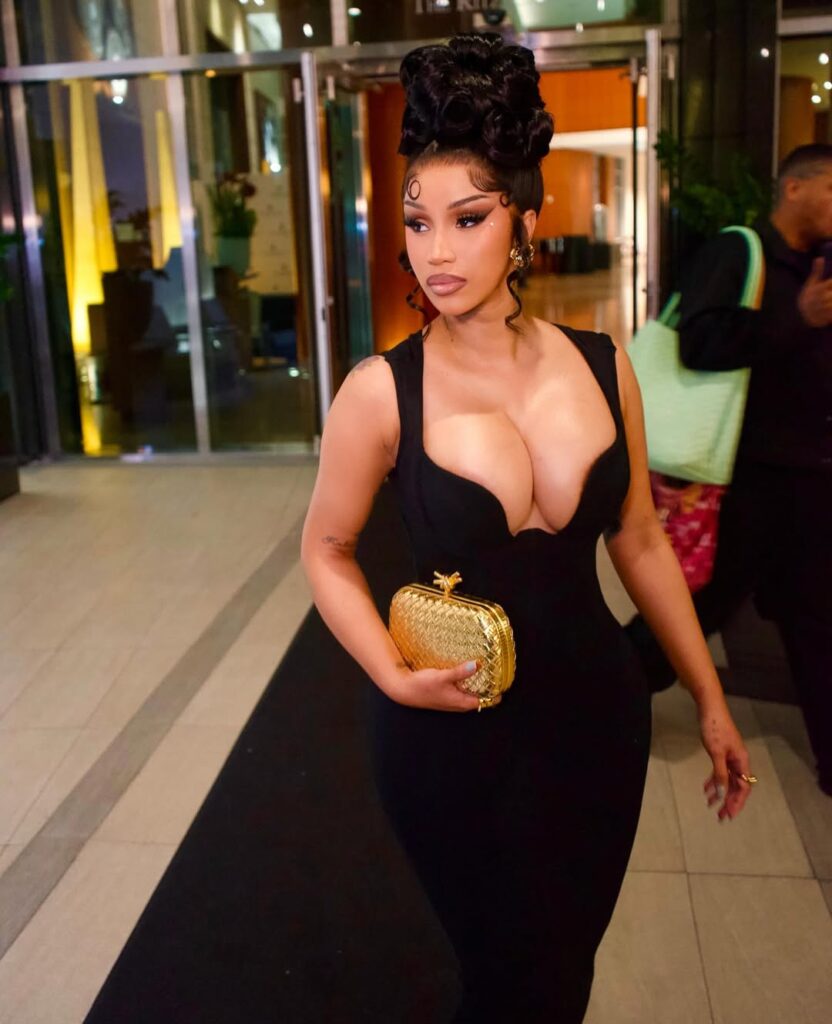 you ask, we answer! cardi b wore a custom candice cuoco dress with rene caovilla sandals for stefon diggs birthday