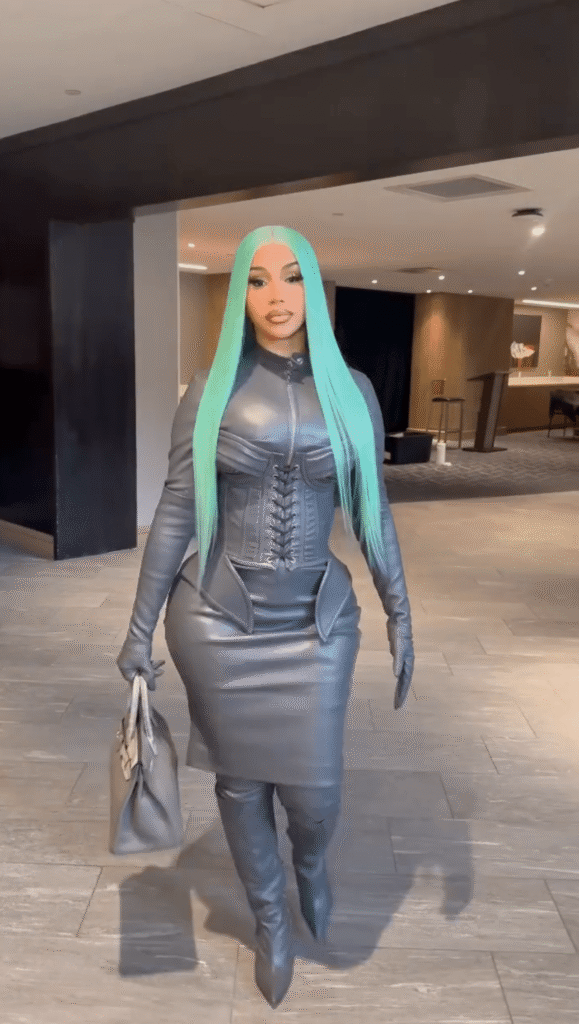 cardi b in a custom gray leather sir babajagne look as she congratulates stefon diggs after patriots super bowl win