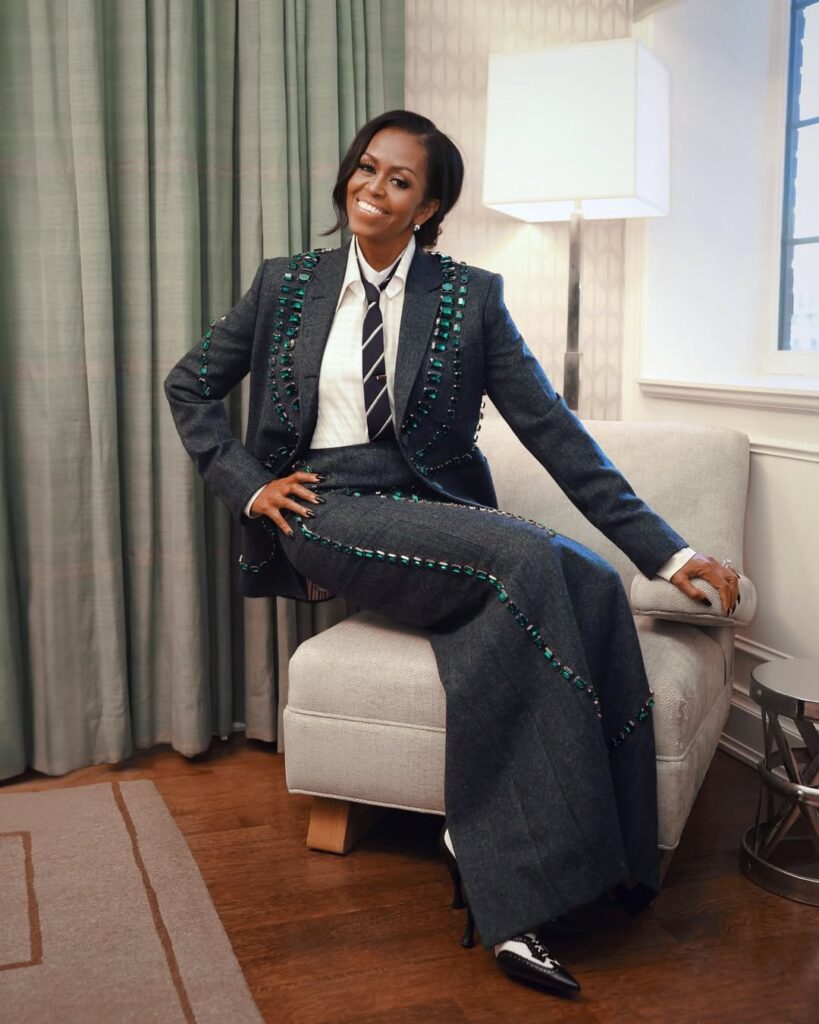 michelle obama looks fierce in a navy plaid thom browne embellished suit