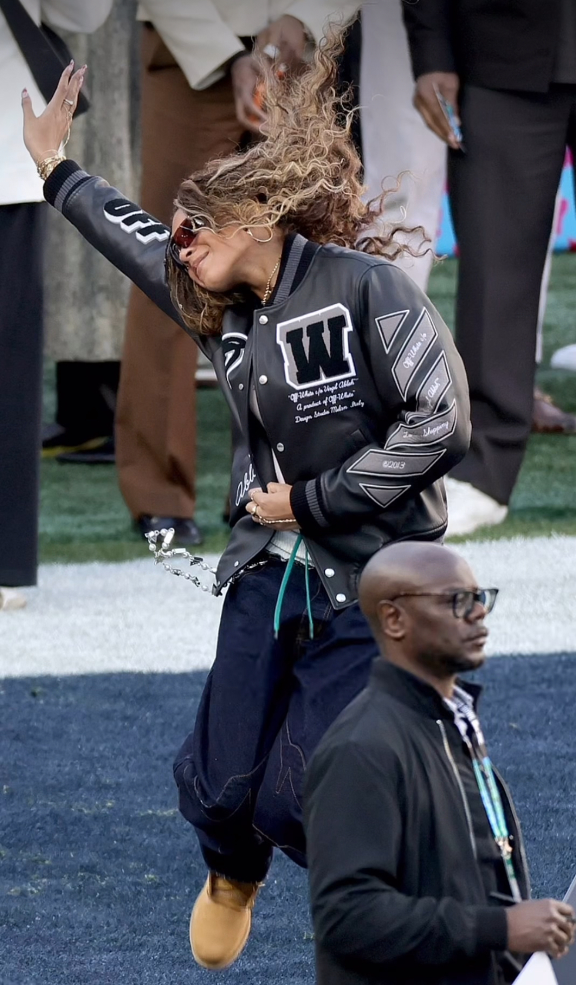 blue ivy attended the super bowl alongside father jay z in a off white letterman jacket and balenciaga handbag
